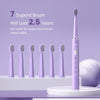 Purple sonic electric toothbrush with 7 Dupont brush heads.