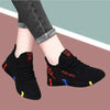 Stylish black vulcanized shoes for women with red and blue details