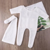 White newborn footed jumpsuit with hat