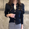 Black long sleeve cardigan with pearl buttons