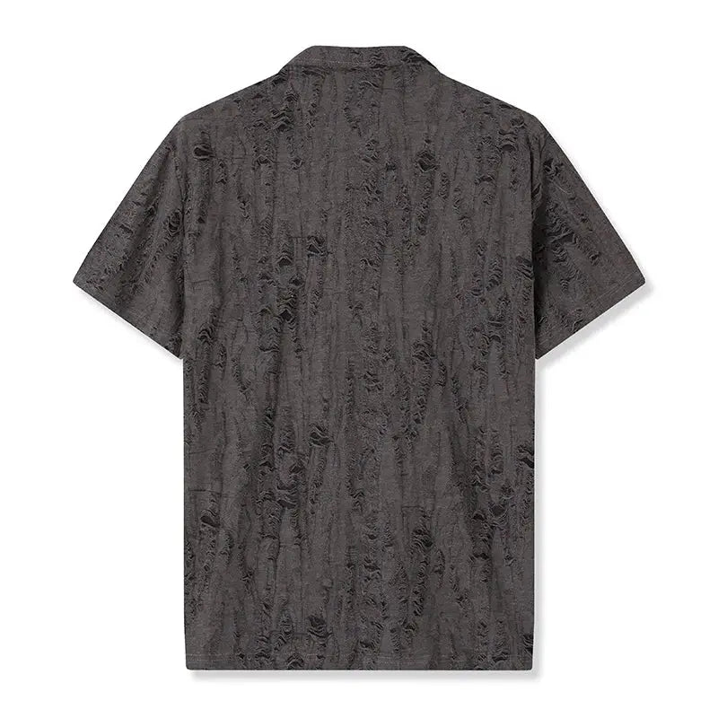 Back view of men’s short sleeve T-shirt in charcoal gray with distressed texture, designed for relaxed summer wear.