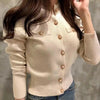 Cream long sleeve knitted sweater with button details