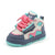 Colorful toddler shoes in teal, pink, and navy