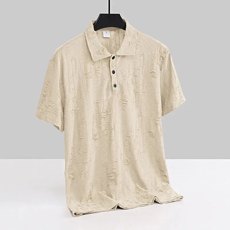 Beige men’s short sleeve T-shirt with buttoned V-neck and worn-look texture, ideal for light and casual summer wear.
