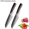 Two Santoku knives with meat and vegetables