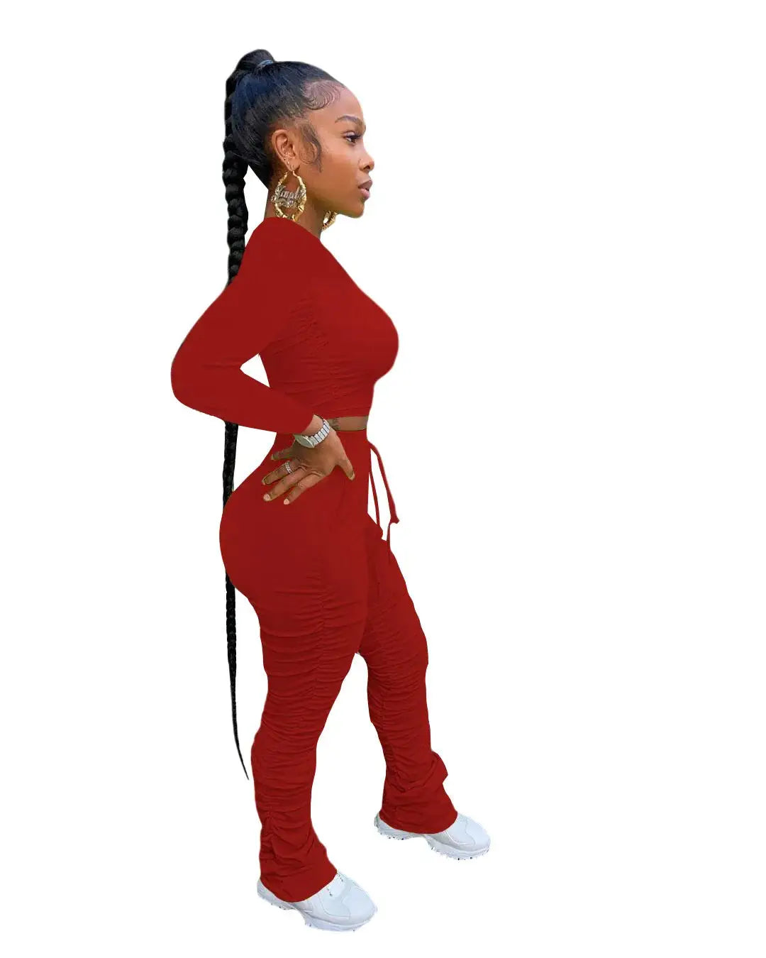 Side view of red Women’s Autumn Two-Piece Sportswear Set showing ruched pants and long sleeve crop top, designed for a slim fit.