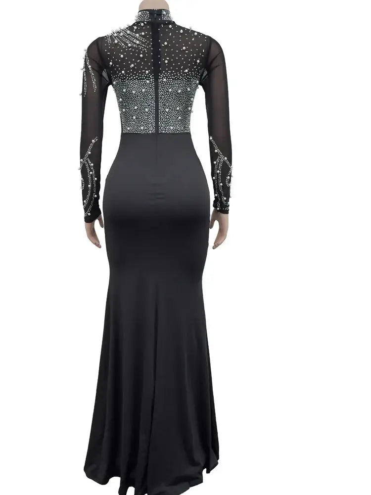 Women’s crystal embellished long party dress with high slit, long sleeves and elegant glam style for evening events