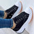 Black women's casual shoes with white toe cap