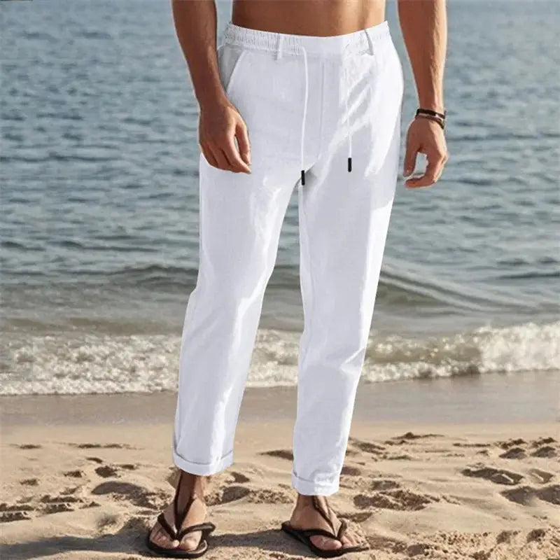 Men's lightweight linen pants with drawstring and pockets in white, ideal for beach and casual summer wear with straight-leg fit and relaxed style.