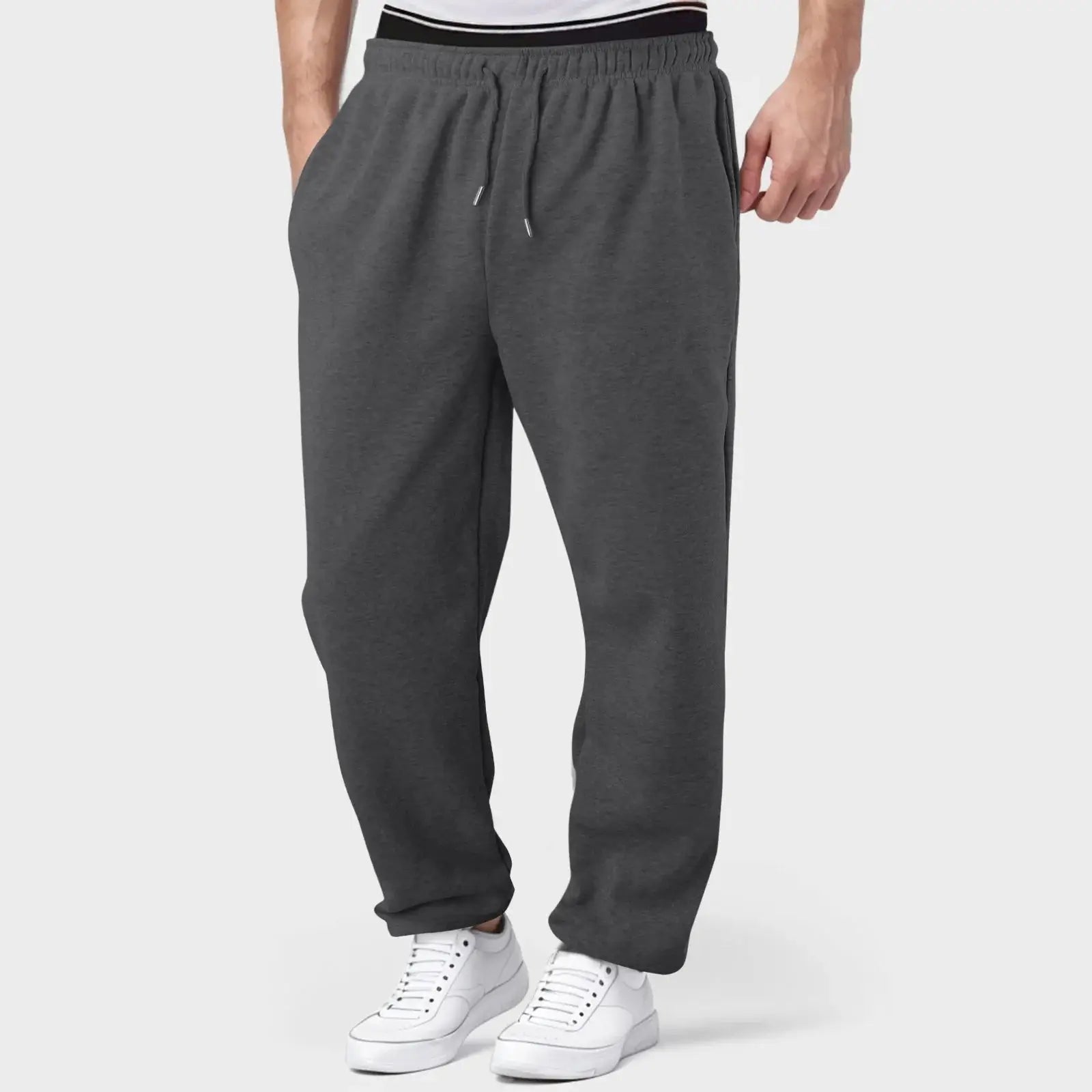Charcoal men’s jogger pants, breathable and lightweight with elastic waistband, suitable for gym, training, and everyday comfort.
