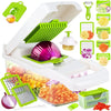 White vegetable cutter with green blades and attachments