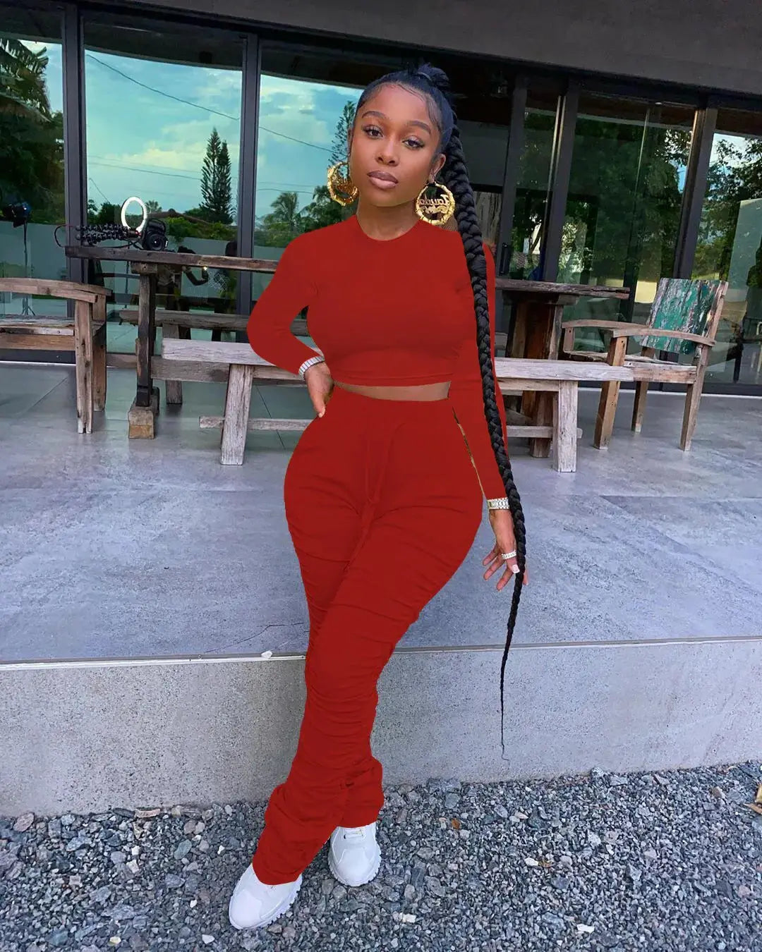 Women’s Autumn Two-Piece Sportswear Set in red with long sleeve crop top and stacked pants, styled for casual outdoor wear.