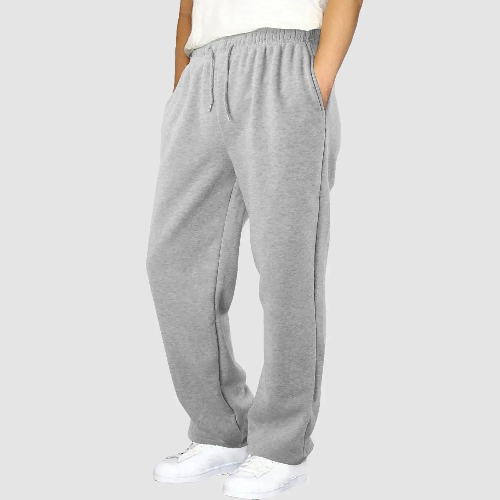 Light grey men’s workout jogger pants, breathable and lightweight with drawstring waist, great for training and casual outfits.