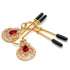 Gold nipple clamps with red jewels