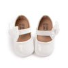 White patent baby shoes with flower design