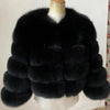 Black faux fur coat on mannequin