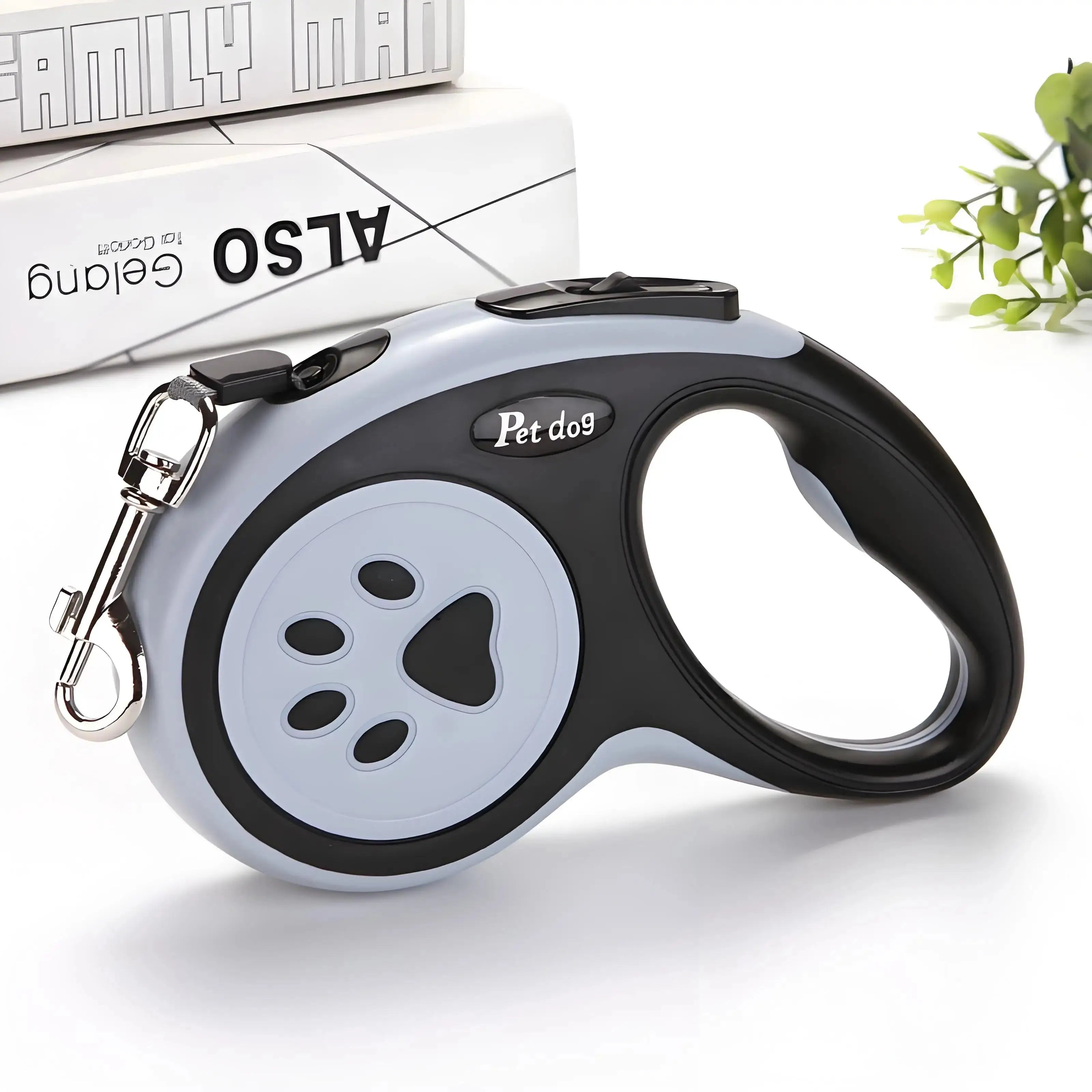 Black and gray Automatic Retractable Nylon Pet Leash with ergonomic grip. Strong extending lead for small pet walking and running activities.