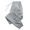 Gray jogging pants with heart and line design