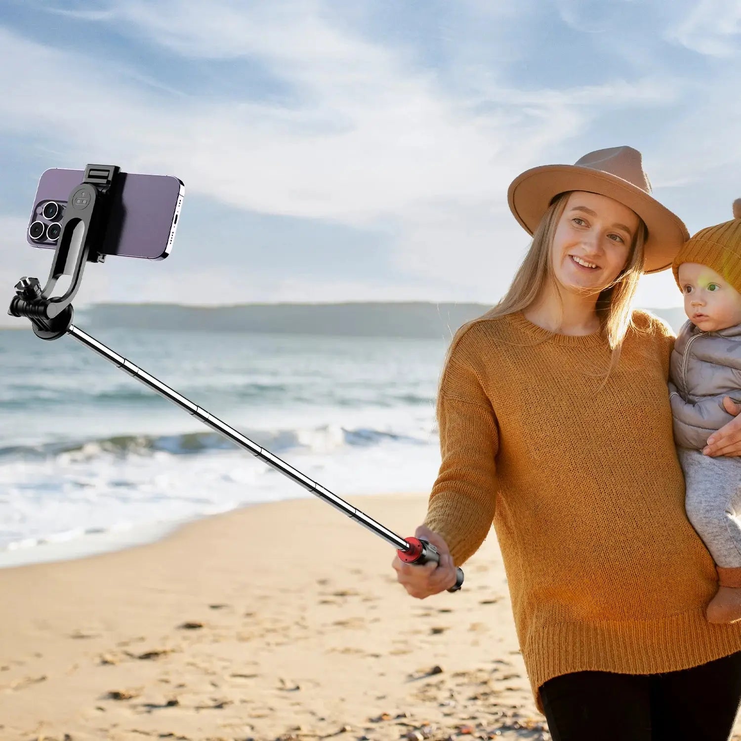 Woman using Bluetooth Selfie Stick Tripod with extended handle for beach selfie, ideal for travel and family photography.