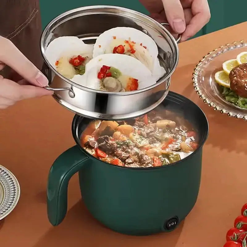 1.5L electric multifunctional cooking pot with nonstick coating shown steaming scallops while cooking stew, ideal for rice, soups, and daily meals.