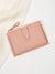 Minimalist short wallet in soft pink on white fabric