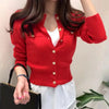 Red long sleeve cardigan with pearl buttons