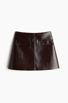 Brown leather mini skirt with pocket details