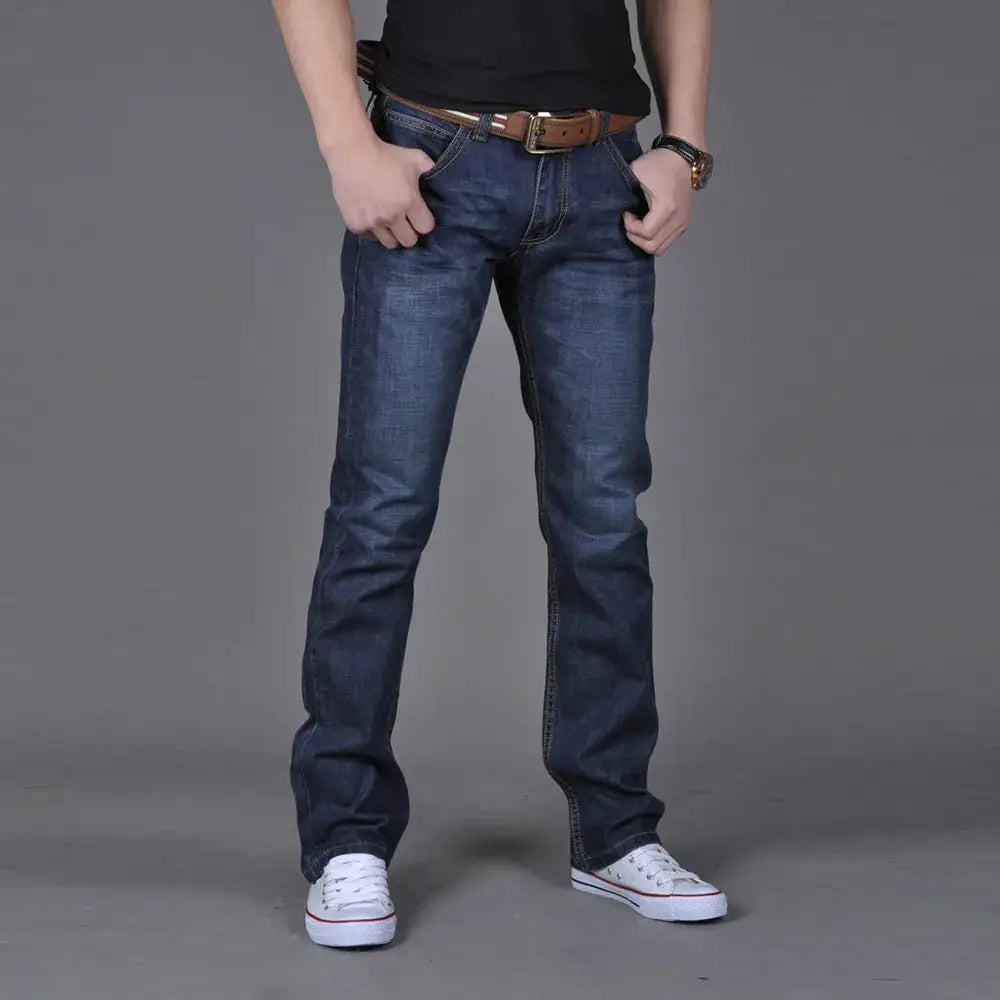 Men’s stretch denim jeans with straight fit styled for casual streetwear, ideal for skateboarding and hip hop fashion lovers.
