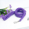 Purple braided dog leash with flowers