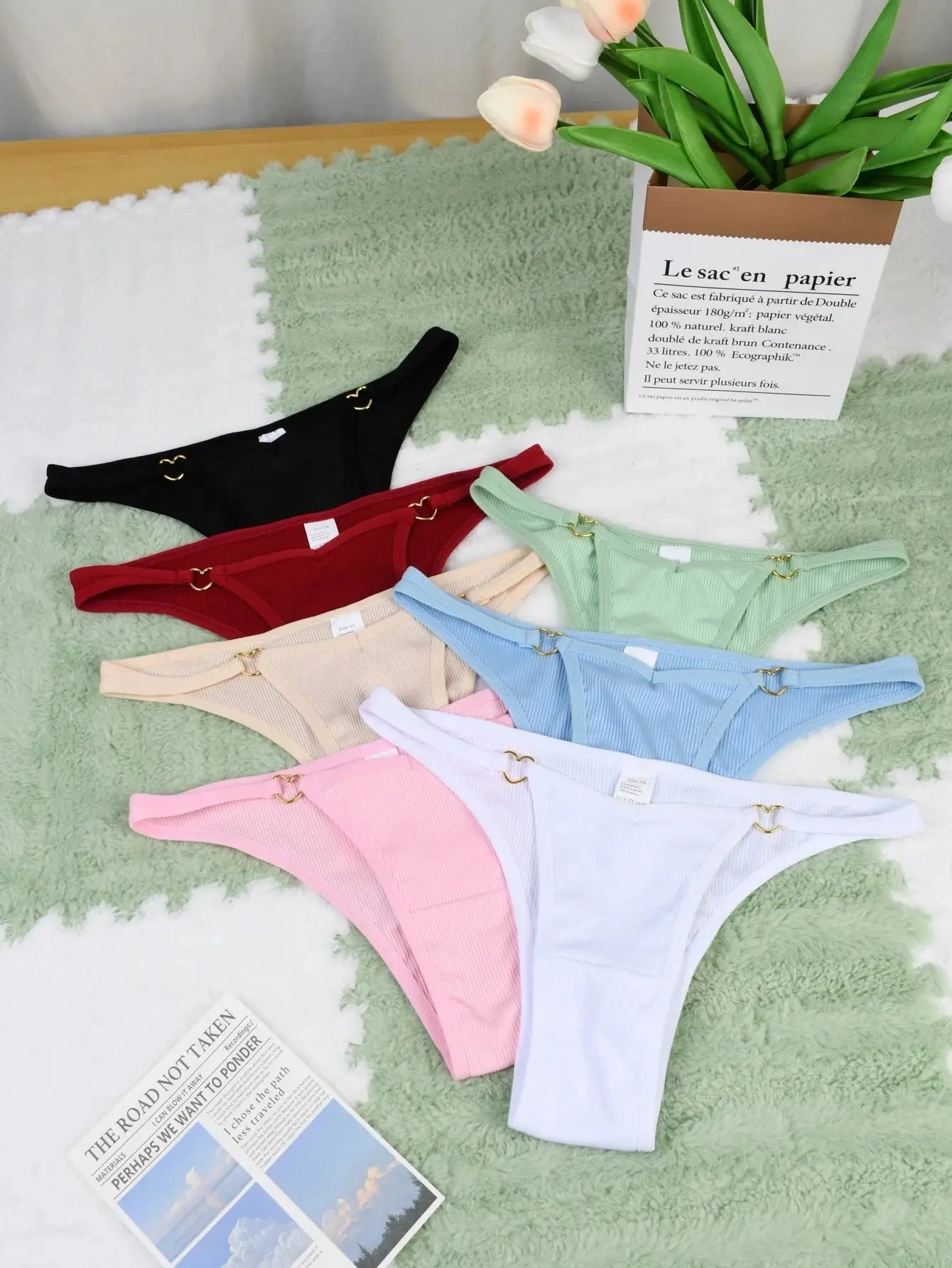7-piece ribbed cotton thong set for women in assorted colors with heart-shaped metal rings, low-rise seamless design for everyday comfort.