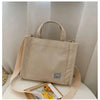 Beige women's corduroy bag with handles and strap