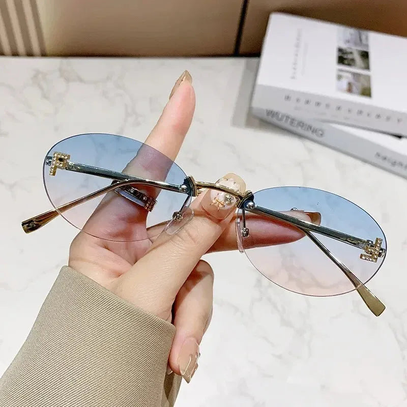 Rimless Oval Sunglasses with Diamond Accent F Letter Design