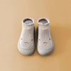 Beige baby shoes with minimalistic design