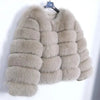 Light gray faux fur coat on hanger