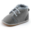 Gray winter baby shoe with fur lining