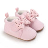 Pink baby shoes with polka dot bows