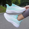 Mint green casual running shoes on road