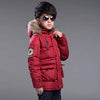 Red hooded winter jacket with fur trim for kids