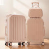 Beige suitcase set with wheels and lock