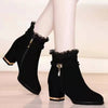 Women's black fashion boots with ruffle trim