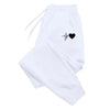 White sweatpants with heart design