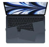 Laptop with dark protective skin covers on keyboard