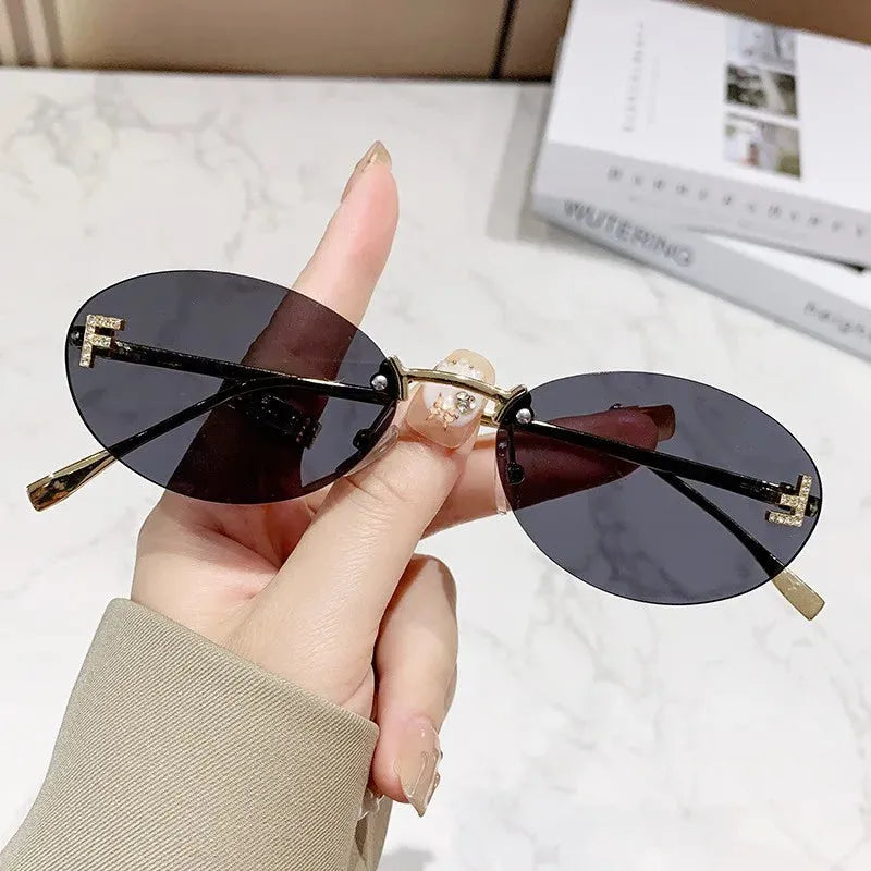 Rimless Oval Sunglasses with Diamond Accent F Letter Design