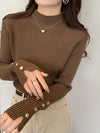 Brown ribbed women's sweater with button accents