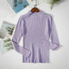 Lavender women's turtleneck sweater on hanger