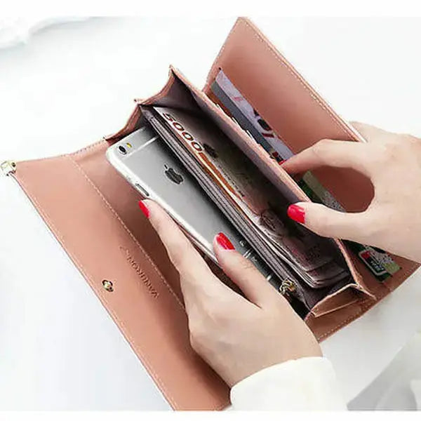 Interior view of Women's Long PU Leather Trifold Wallet showing compartments for phone, cash, and cards, designed for organized daily use.