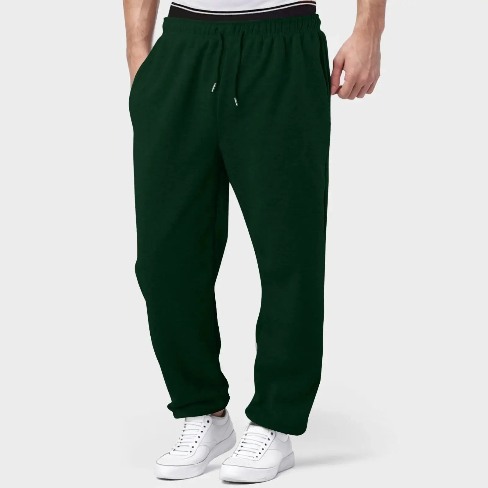 Men’s workout jogger pants in forest green, breathable and lightweight with elastic waist, ideal for training and casual wear.