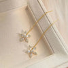 Gold starburst crystal thread chain earrings