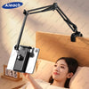 Tablet holder for bed with adjustable metal arm in use