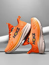 Orange men's marathon running shoes with black logo